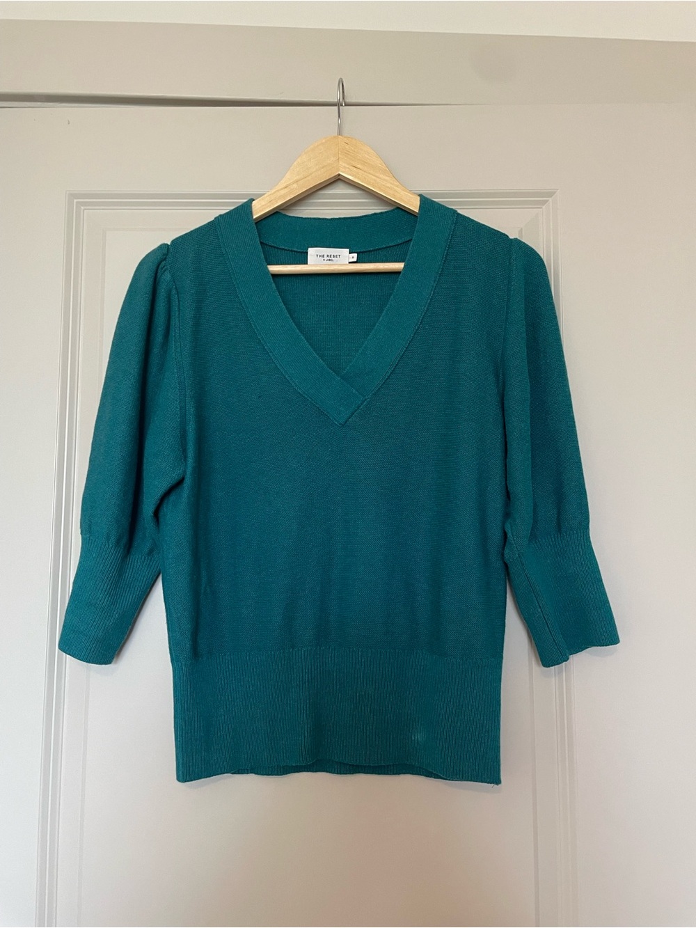 The Reset Teal V-Neck Sweater